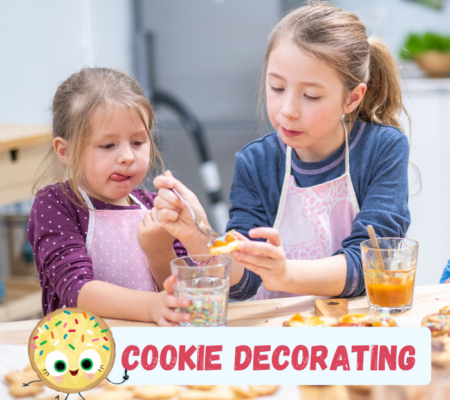 photo of kids decorating cookies