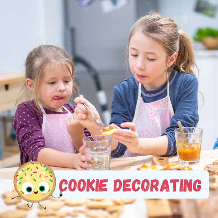 photo of kids decorating cookies