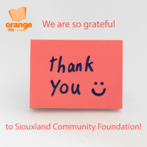 pink sticky note with words Thank You and a smiley face. Text that says We are so grateful to Siouxland Community Foundation.