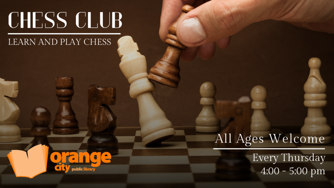 fingers moving a pawn on a chess board